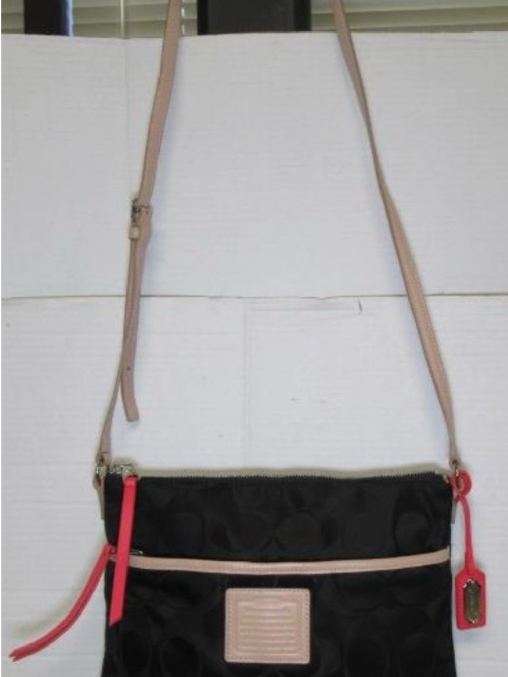 Coach Black Crossbody Bag with Pink Trim and Strap Accents
